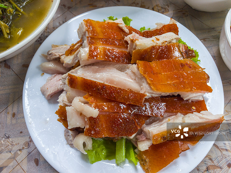 云南省德宏州陇川县火烧猪美食图片素材