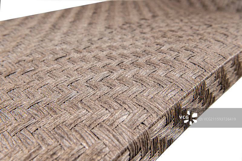 白色背景下的户外编藤躺椅细节展示图片素材