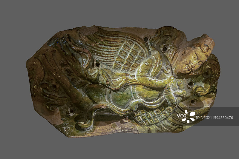 内蒙古呼和浩特博物院：黄绿釉浮雕迦陵频伽纹砖（元，呼和浩特市武川县出土，呼和浩特博物院藏）图片素材