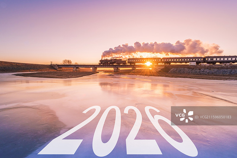 2026新年元旦日出冰河上的铁路蒸汽机车图片素材