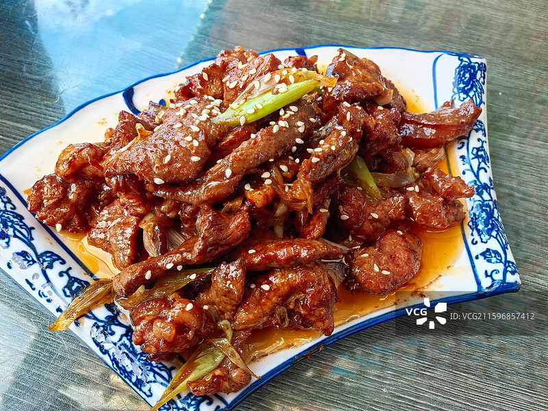 西藏美食葱爆牛肉图片素材