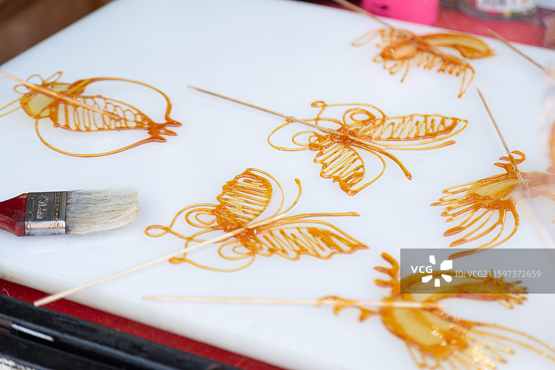 四川成都青白江区城厢古城街头的非遗糖画图片素材