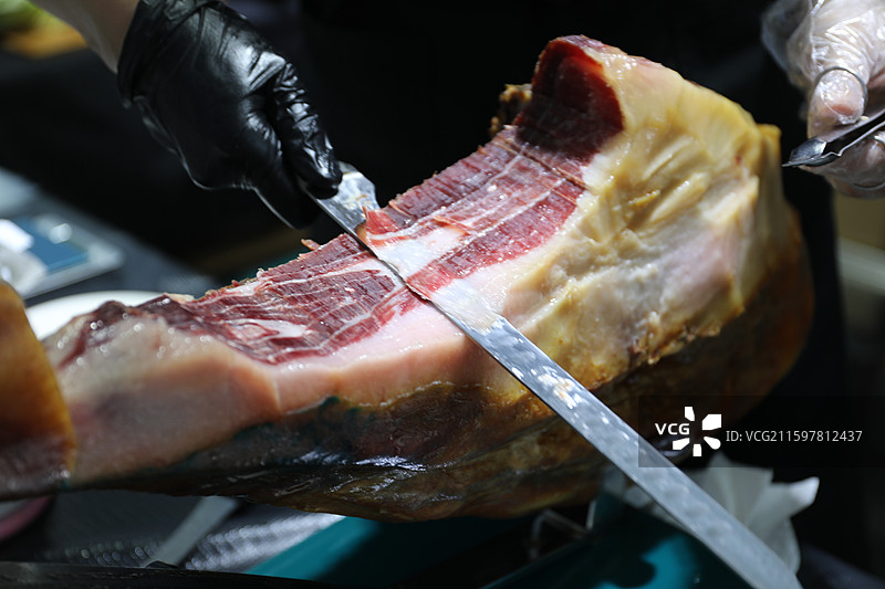 西班牙伊比利亚火腿切片过程图片素材