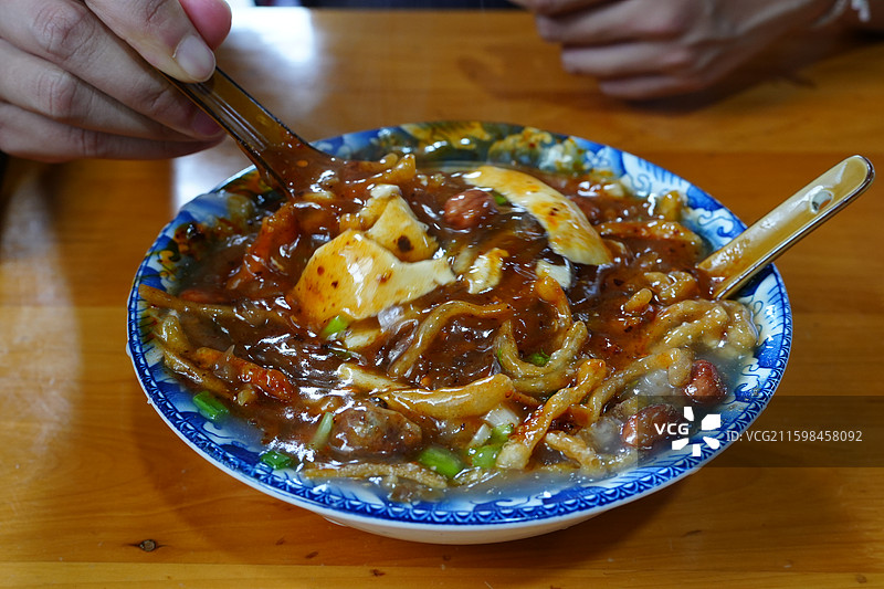 乐山苏稽古镇美食，甜皮鸭，跷脚牛肉图片素材