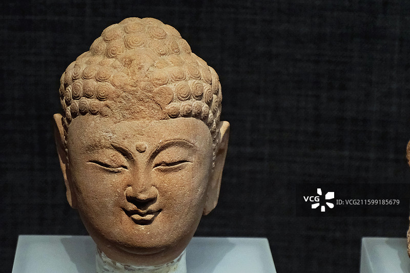 河北邯郸邺城博物馆藏唐代红砂石螺发像头像图片素材