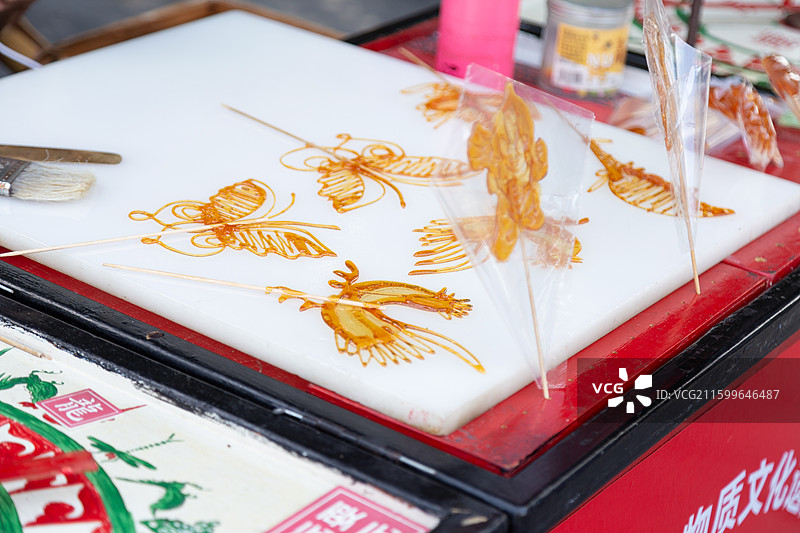 四川成都青白江区城厢古城街头的非遗糖画图片素材