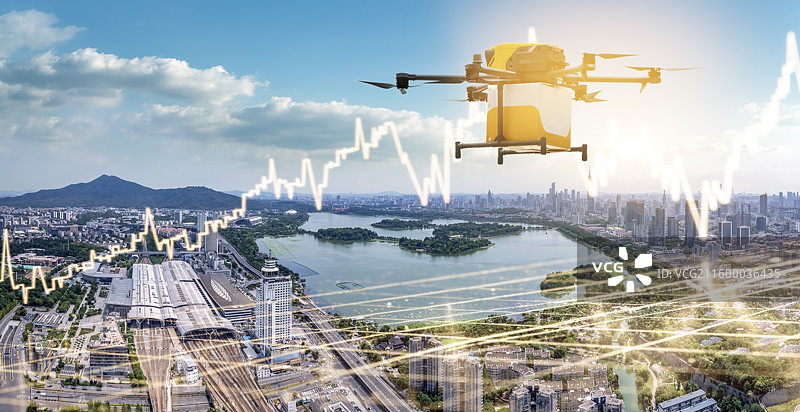 城市上空无人机与金融图表图片素材