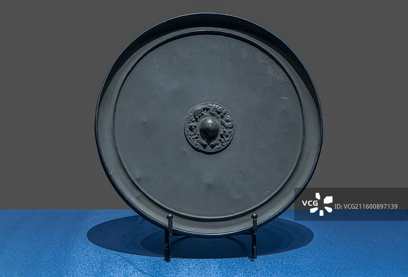 辽宁省沈阳博物馆“沈阳历史陈列”：铜镜（金，大东区崇寿寺塔出土）图片素材