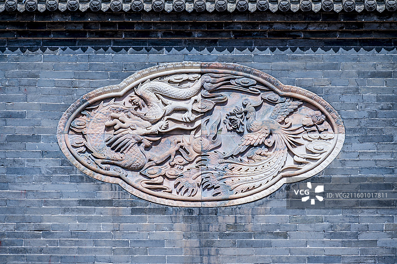 山西长治上党宋代“明五暗四”道教飞檐结构——玉皇观五凤楼龙凤浮雕图片素材