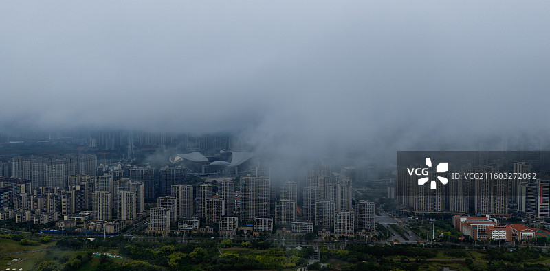 航拍云雾下的广西南宁总部基地风光图片素材