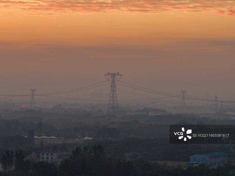 无锡市严家桥乡村日出风光和电力输送设备图片素材