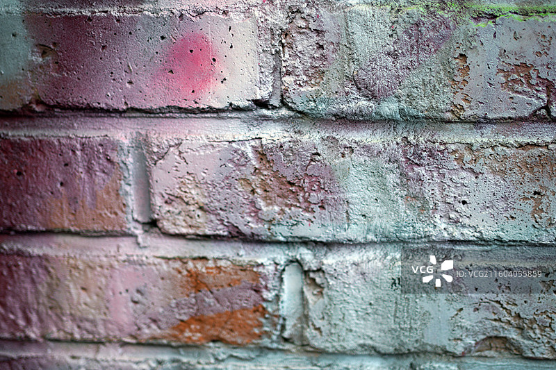 老旧砖墙特写带多彩斑块图片素材