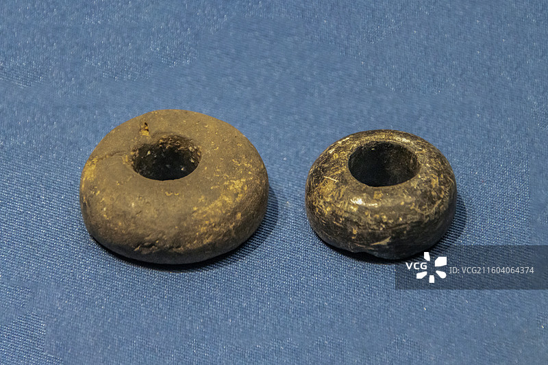 辽宁省沈阳博物馆“沈阳历史陈列”：石纺轮（汉唐，浑南区石台子山城出土）图片素材