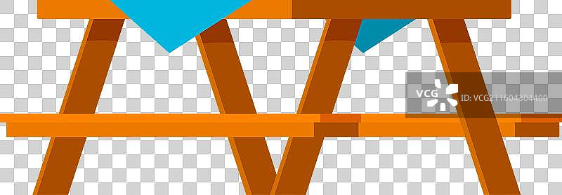 一张带有蓝色桌布的木制野餐桌图片素材