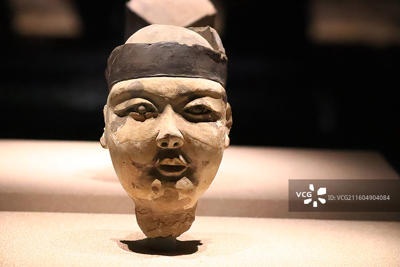 山西博物院戏曲副净俑头像图片素材