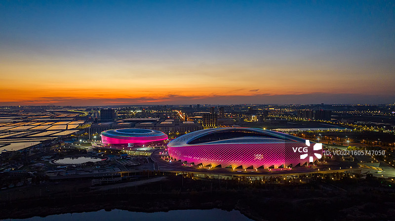 航拍海滨体育场晚霞灯光图片素材