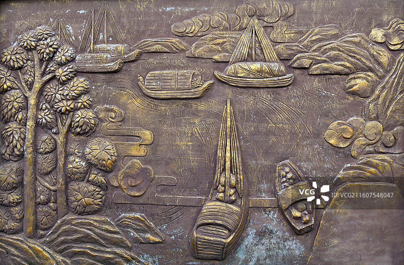 江苏省徐州市铜山区利国镇西李村的古村落景区古风河畔人物浮雕图景图片素材