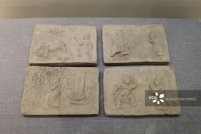 山西襄汾金墓孝子故事雕砖 虞舜(左上) 陆绩(右上) 曹娥(左下) 郭巨(右下) 年代：金代 质地陶图片素材