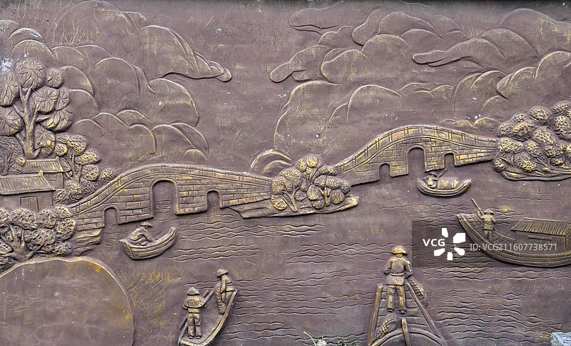 江苏省徐州市铜山区利国镇西李村的古村落景区古风河畔人物浮雕图景图片素材