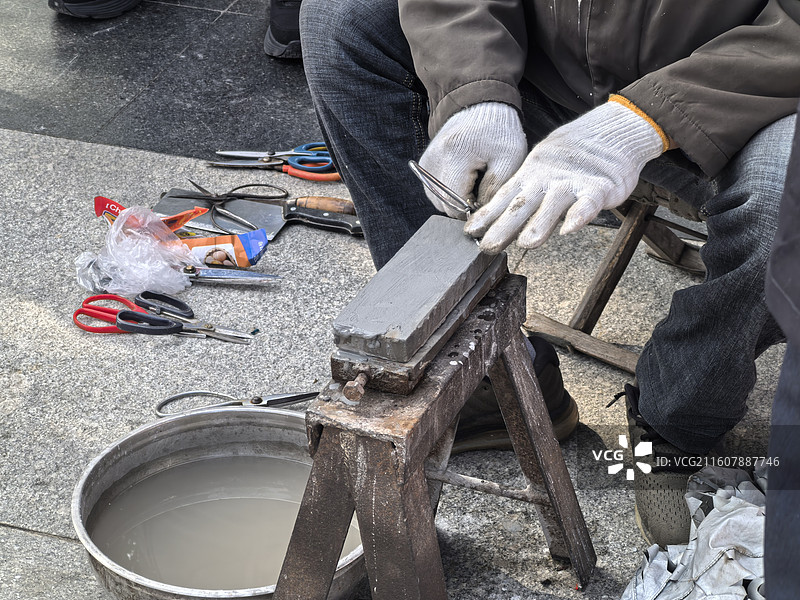 磨剪子图片素材