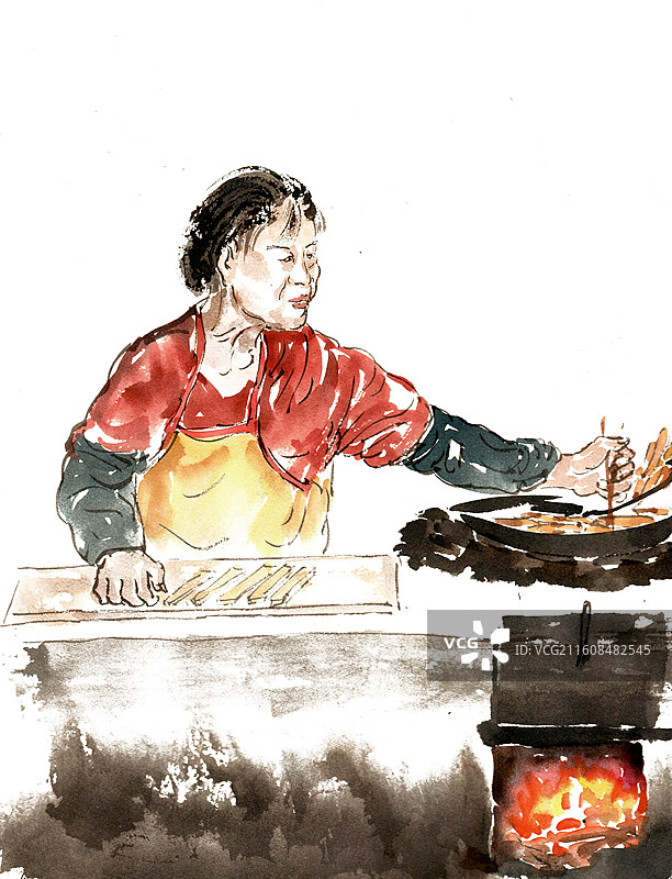 炸油条的女子图片素材