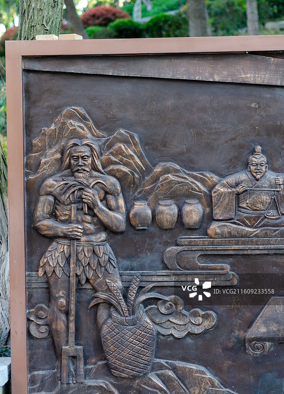 古代人物炎帝耕种主题浮雕图片素材