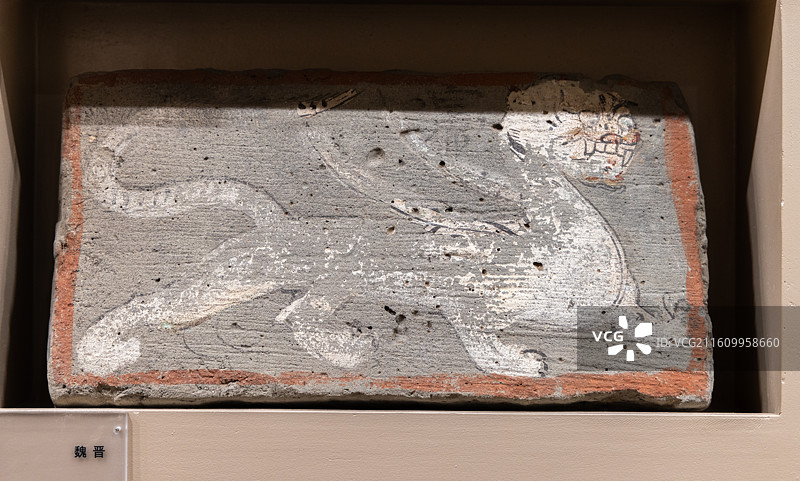 甘肃酒泉敦煌博物馆 魏晋 白虎画像砖 1991年佛爷庙墓群图片素材