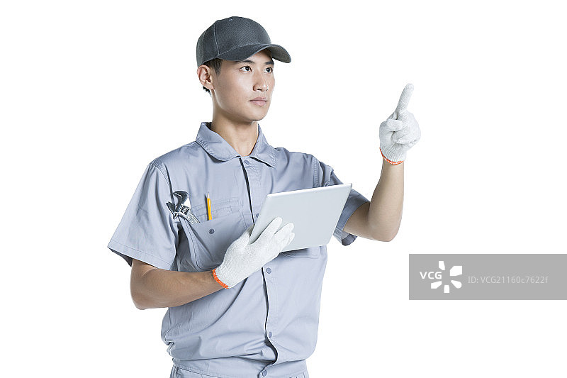修理工拿着平板电脑图片素材