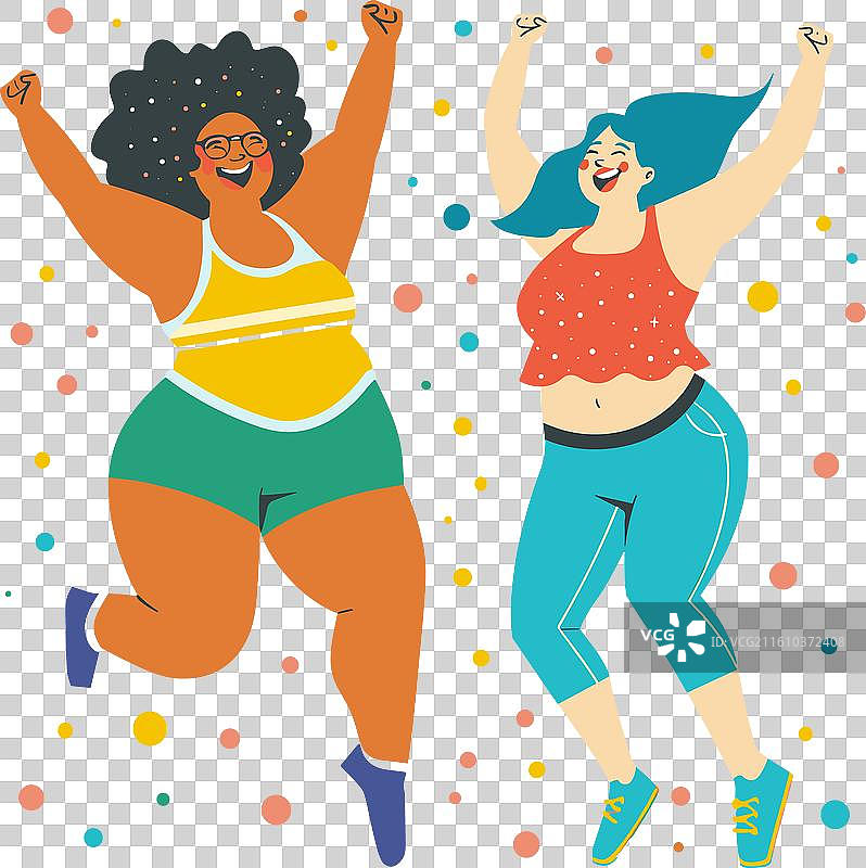 两位不同肤色的女性快乐地跳舞庆祝图片素材