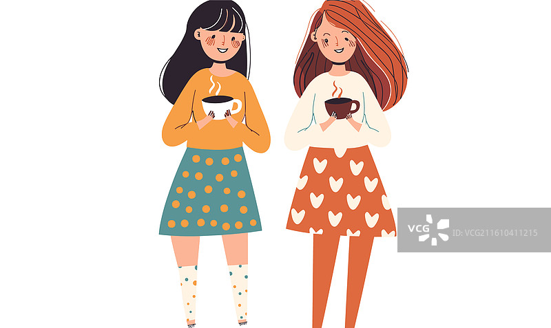 两位年轻的女士正在一起享用热饮图片素材