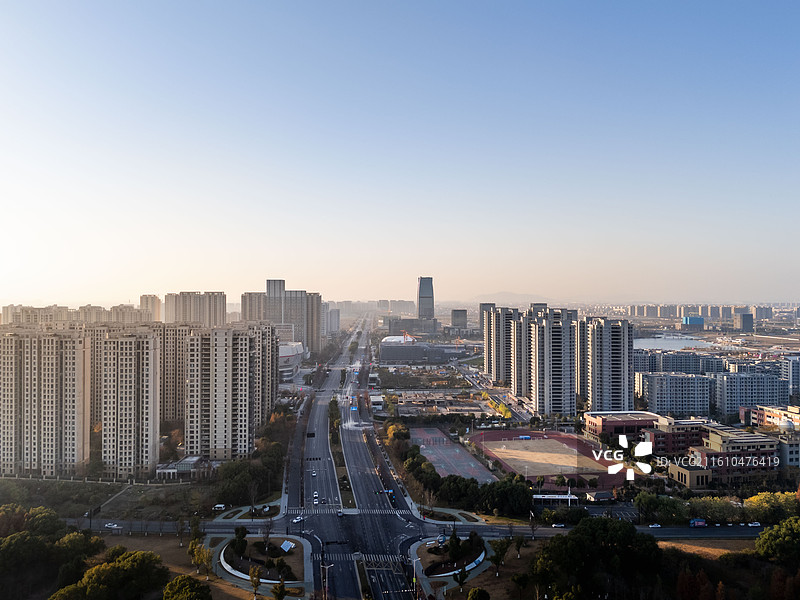 日出时分，杭州钱塘区大江东江海之城现代化新城航拍图片素材