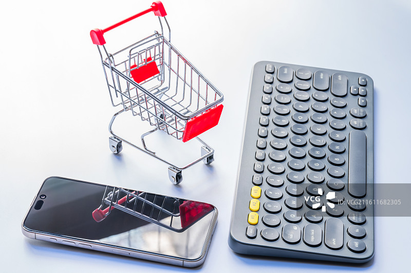 键盘、购物车、手机与白色背景图片素材