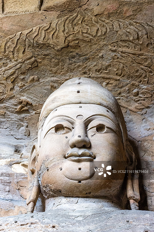 中国山西大同云冈石窟 第3窟灵岩寺洞石刻大佛佛头局部特写图片素材