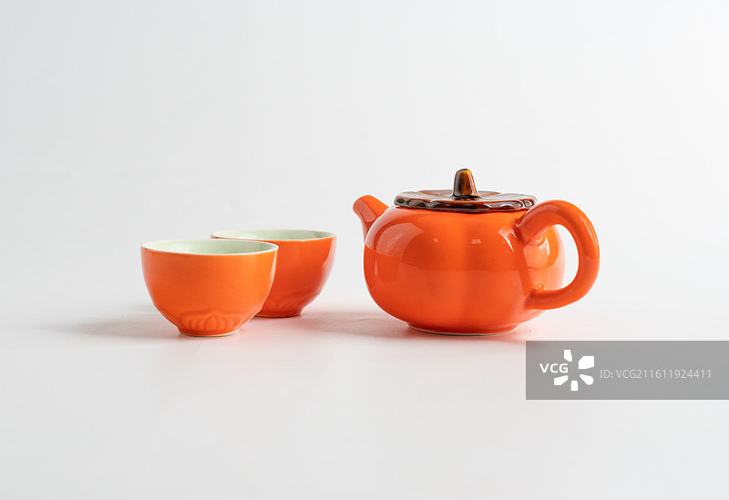橙色茶壶茶杯图片素材