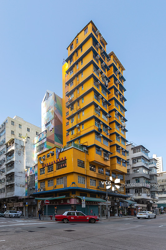 香港地标建筑深水埗小黄楼图片素材