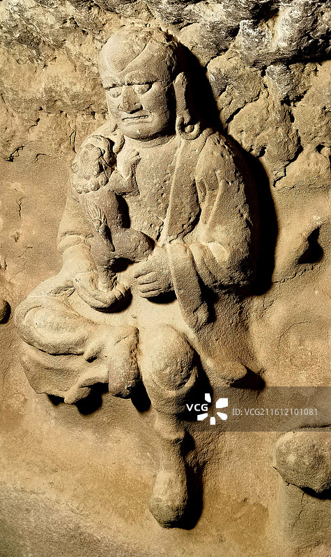 抱宠物的佛像图片素材