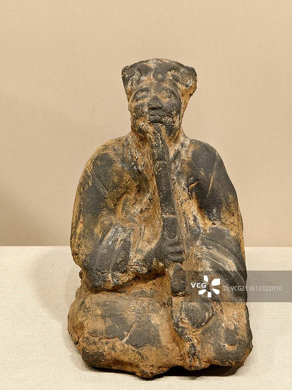 云南省博物馆～吹箫俑，东汉图片素材