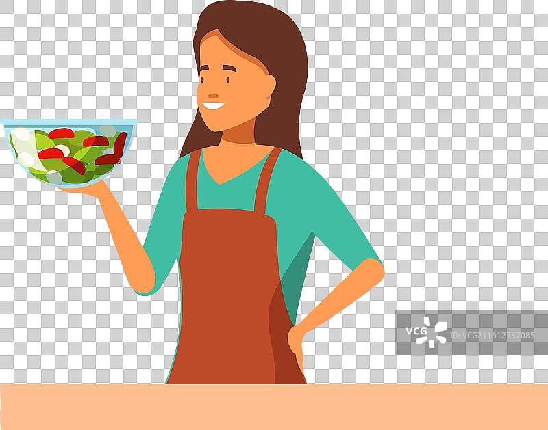 年轻的女厨师手里拿着一碗新鲜的食材图片素材