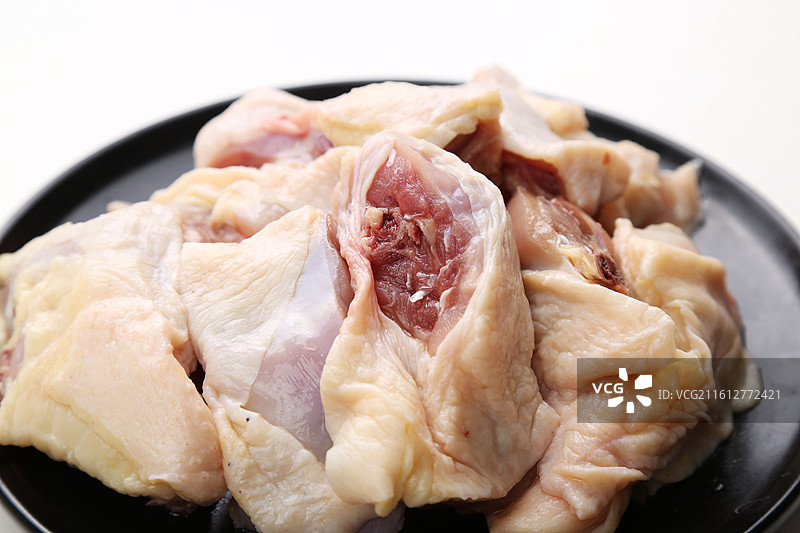 新鲜切块生鸡肉图片素材