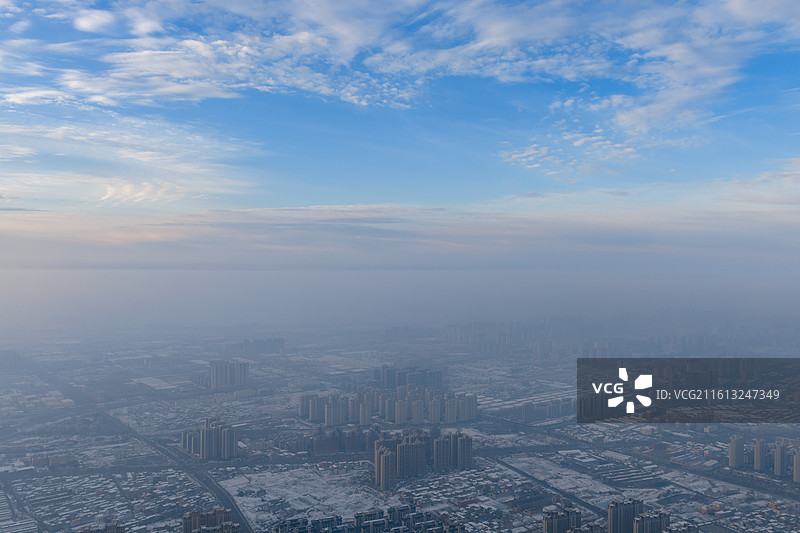河南周口市城乡一体化示范区大雪后清晨日出多云薄雾高视角场景图片素材