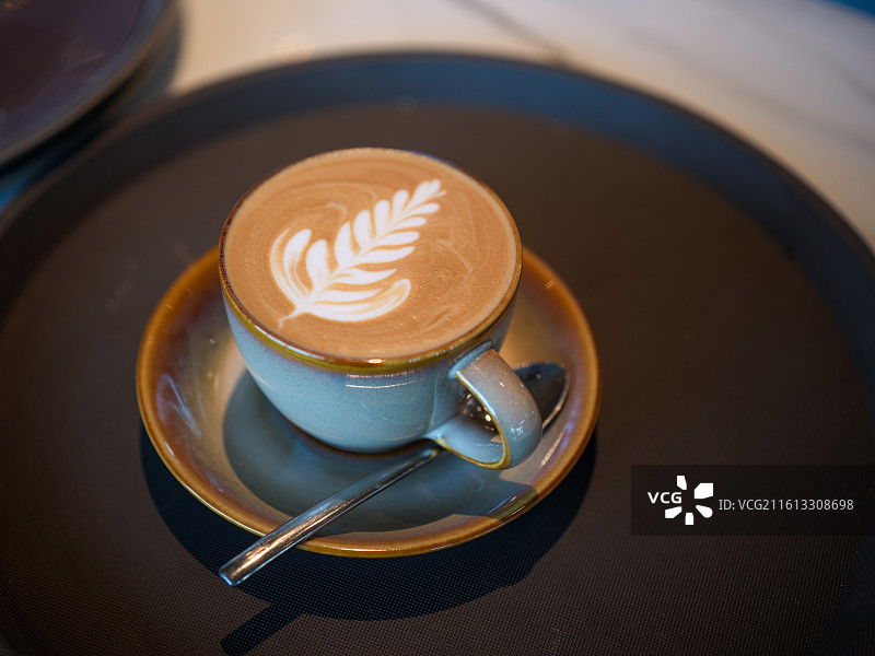 带有拉花的卡布奇诺咖啡图片素材