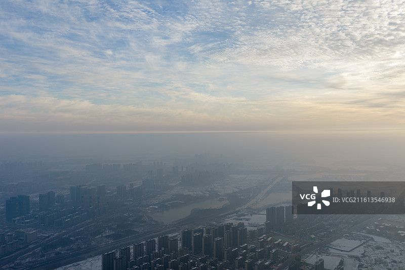 河南周口市城乡一体化示范区大雪后清晨日出多云薄雾高视角场景图片素材