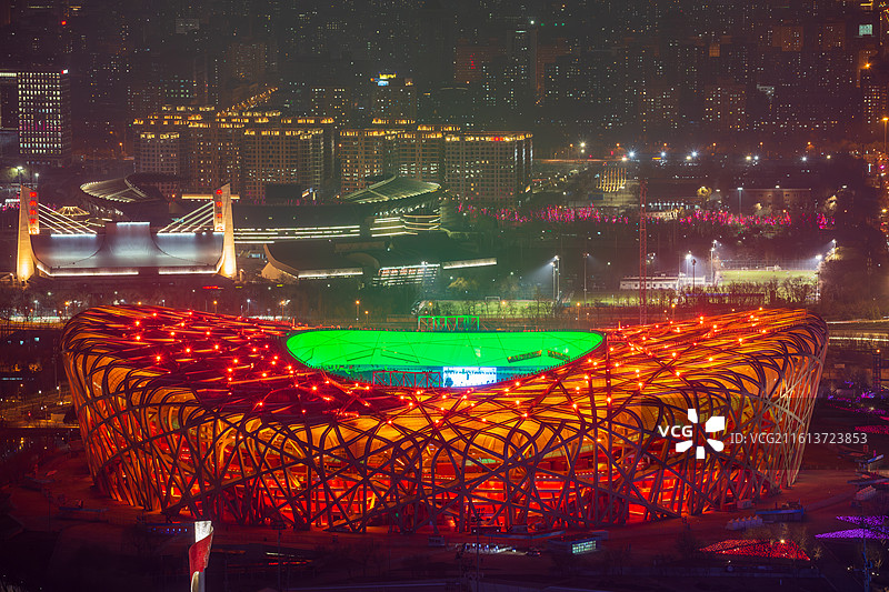 北京国家体育场鸟巢红绿灯光秀夜景航拍图片素材