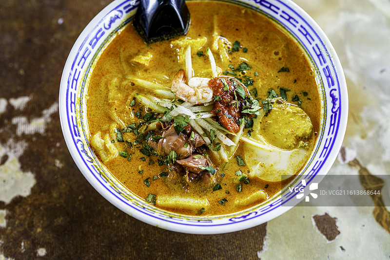 马来西亚世界遗产城市马六甲香江茶冰室富有地域特色的马六甲叻沙图片素材