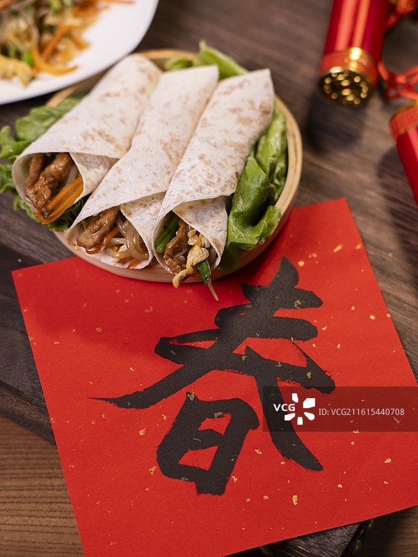 立春节气卷春饼图片素材