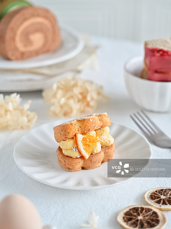 甜品蛋糕糕点橙子下午茶亮调特写图片素材
