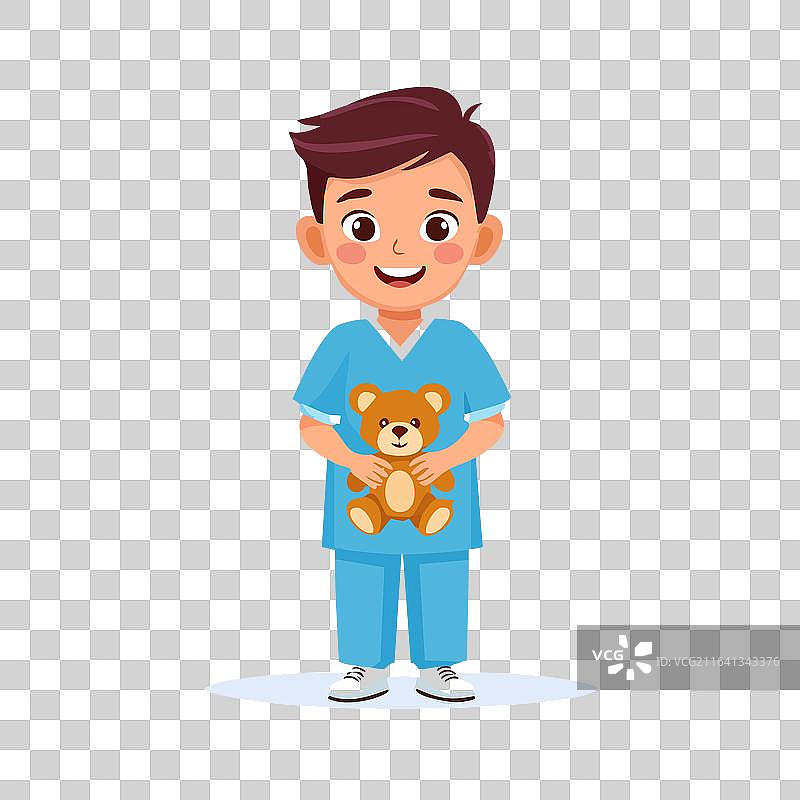 穿着蓝色手术服的男孩微笑着抱着泰迪熊图片素材