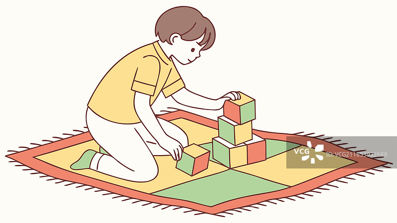 孩子专注地玩积木，发挥创意图片素材