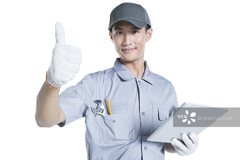 修理工拿着平板电脑图片素材
