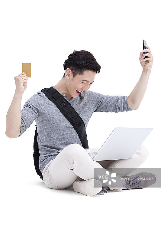 大学男生网上购物图片素材